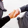 close up of business men shaking hands